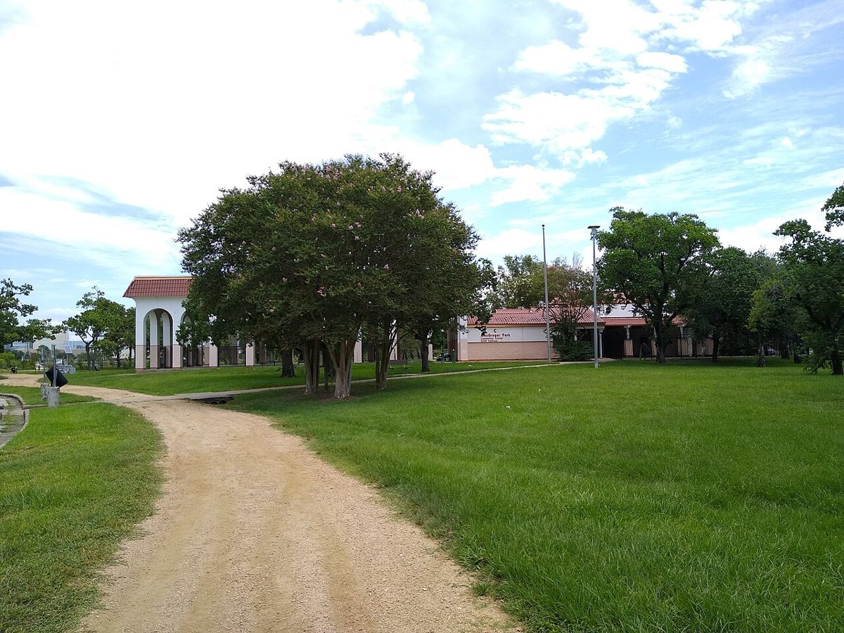 The bayou trail and open fields at MacGregor Park in Houston's Third Ward
